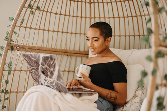 A Young Black Woman Working From Home