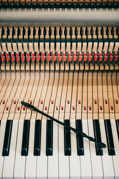 Piano with tuning equipment