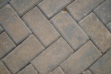 Close-up of the tiles of a gray floor useful for urban backgrounds