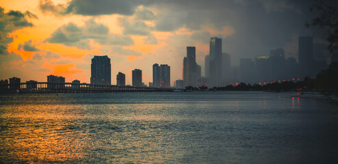 city skyline at sunset rain sea miami florida buildings 