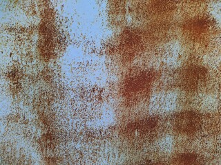 Colored rusty stained metal wall texture pattern