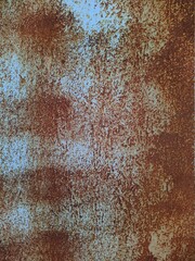 Colored rusty stained metal wall texture pattern