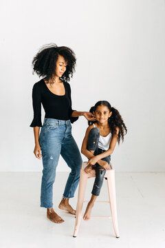 A mother and daughter having fun in the studio.