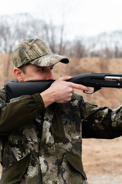 Male hunter ready to shoot