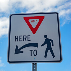 Yield to pedestrian sign