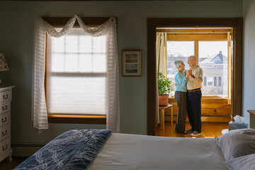 Adorable Senior Citizen Couple Dancing together