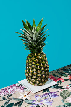pineapple on a floral background