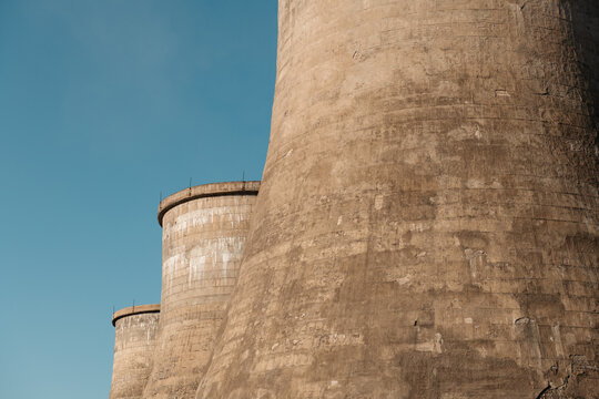 Exterior of grungy factory pipes