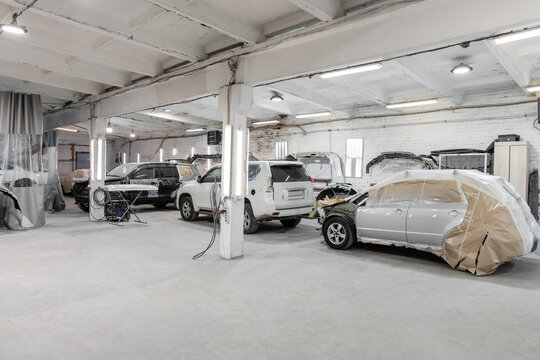 Modern vehicles in spacious garage