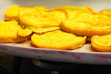 Platter of vegan pumpkin pancakes in the fall