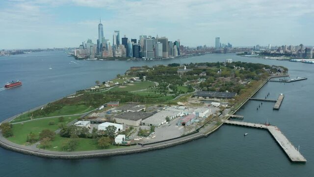 Flying north along east side of Governor's Island towards NYC