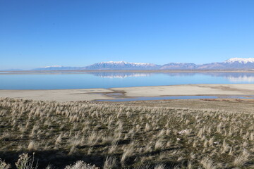 Reflections of Wasatch Mountains in the Great Salt Lake, Antelope Island State Park, Utah