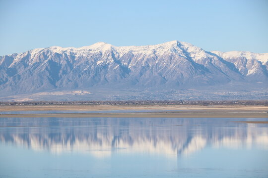 Reflections of Wasatch Mountains in the Great Salt Lake, Antelope Island State Park, Utah