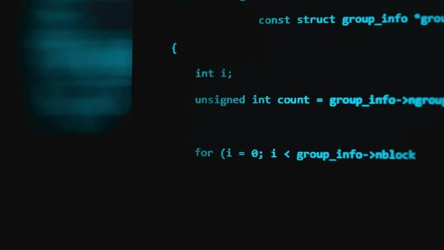 Modern tech. Program development and blockchain concept. Developer working on program codes in office. Shallow depth of field bokeh, selective focus effect. Hacking or protection data