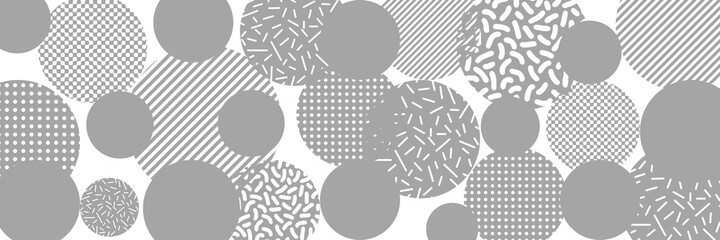 Abstract vector background, banner. Irregular circles of different sizes. Shades of gray.