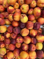 natural background nectarines in boxes, selective focus