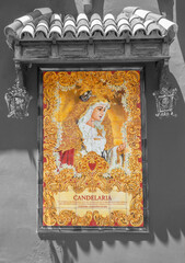 CORDOBA, SPAIN - MAY 26, 2015: The ceramic tiled cryed Madonna on the Compas de San Francisco square by C. J. Soriano (2007).