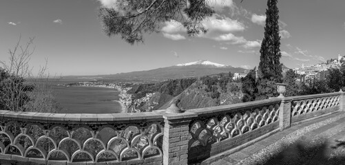 Taormina and Mt. Etna volcano in the bacground from the Public gardens  - Sicily.