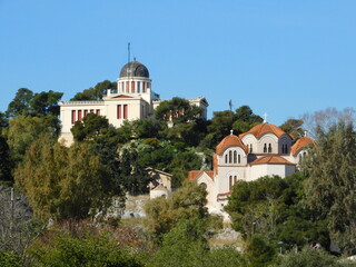 The National Stellar Observatory, and a church, in Athens Greece