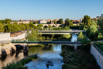 Fototapeta na wymiar Gardens on the banks of the Manzanares River in the area known as Madrid Rio in Madrid, Spain