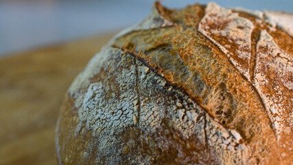 Close-up of opening in crust of homemade sourdough bread