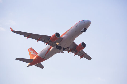 BARCELONA, SPAIN - JANUARY 26, 2020: Takeoff of easyJet Airline Airbus A320 HB-JXR in traditional livery from El Prat Airport in Barcelona