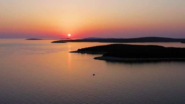 Aerial shot of a beautiful sunset over the island of Mali Losinj, in Croatia. Adriatic sea.