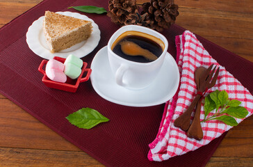 Hot coffee and cakes on the wooden table