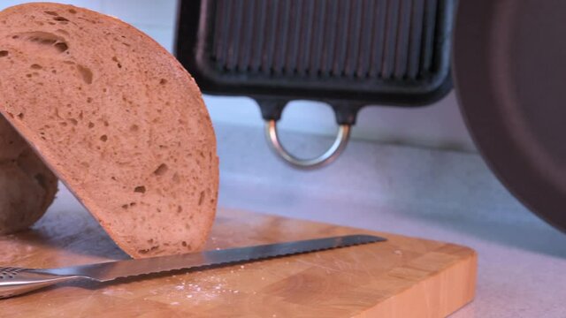 Slide past steaming hot freshly baked artisan sourdough bread