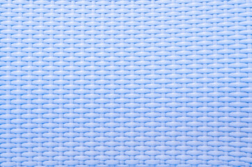 Plastic weaving from blue strands obtained from recycled waste.