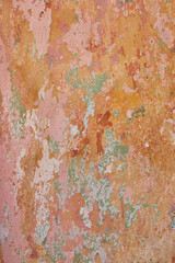Pink, orange and red pattern on a wall