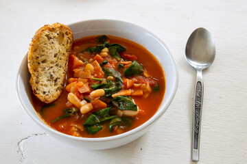 Homemade Ribollita, tuscan bean soup with seed & grains sourdough