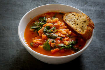Homemade Ribollita, tuscan bean soup with seed & grains sourdough