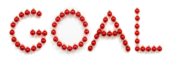 Red Christmas Ball Ornament Building English Word Goal. Festive Christmas Decoration. White Isolated Background