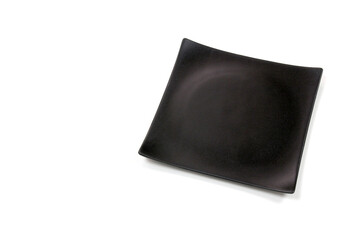 Empty black square ceramic plate with rough texture, isolated on white background with clipping path, Top view