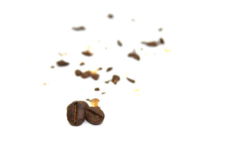 Coffee beans break into small piece close-up on white background