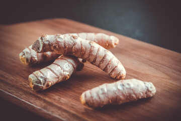 Turmeric root on a cutting board