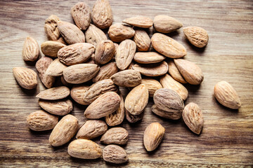 Almonds on a wooden cutting board