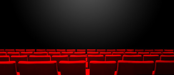 Cinema movie theatre with red seats rows and a black background. Horizontal banner