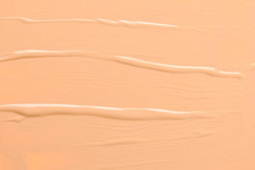 Liquid foundation texture. Make up for women. Top view.