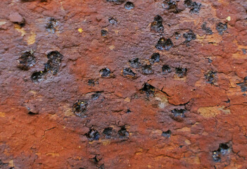 Steel walkway mats sprayed red rust.Iron surface rust