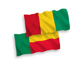 Flags of Guinea and Benin on a white background