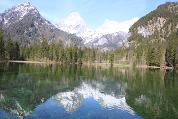 Naklejka na ściany i meble Schiederweiher - beautiful lake in Austria with snowy mountains in background