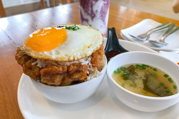 Kimchi fried rice with fried egg and pork. Korean food style.