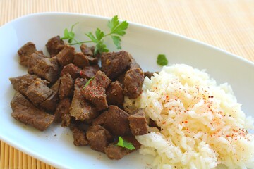 cow liver chops with rice and spices