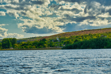 Dniester river in autumn with beautiful cloudy sky