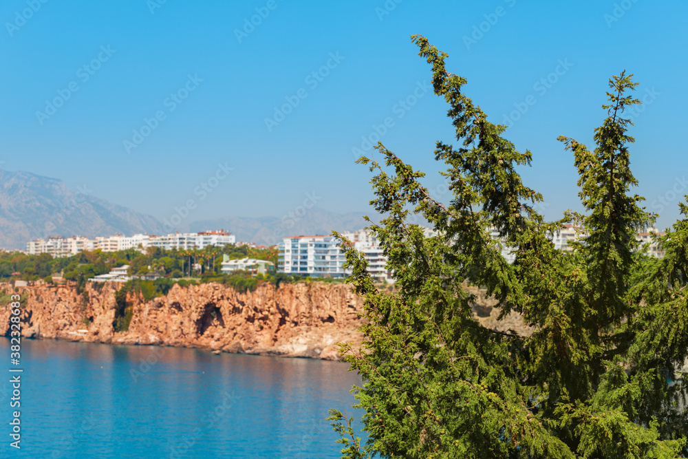 Wall mural panoramic idyllic view of the sea coast in antalya. taurus mountains in the background and the blue 