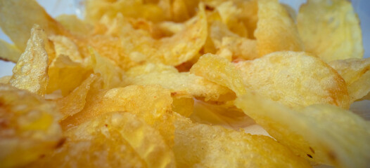 Macro shot of potato chips in packet