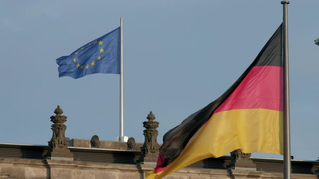 German and EU flags on Reichstag