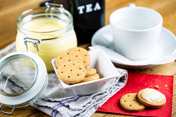 Tea breakfast with cookies. Selective focus on subjects.